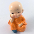 Bộ 4 chú tiểu cầu an để xe hơi