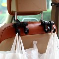Móc treo đồ ô tô gài sau ghế nhỏ gọn hữu dụng