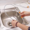 Dụng cụ gắp rác thông tắc cống lò xo đa năng